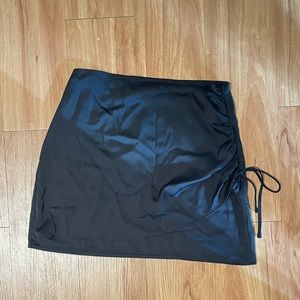 Black silk mini skirt